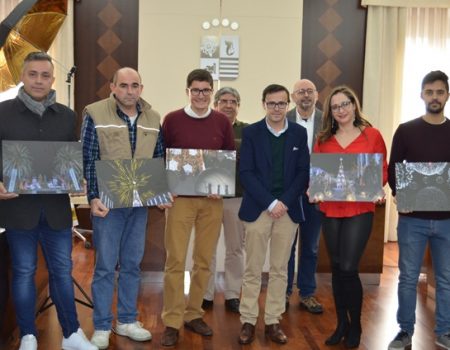 Los ganadores de la primera maratón fotográfica de Navidad, reciben sus premios